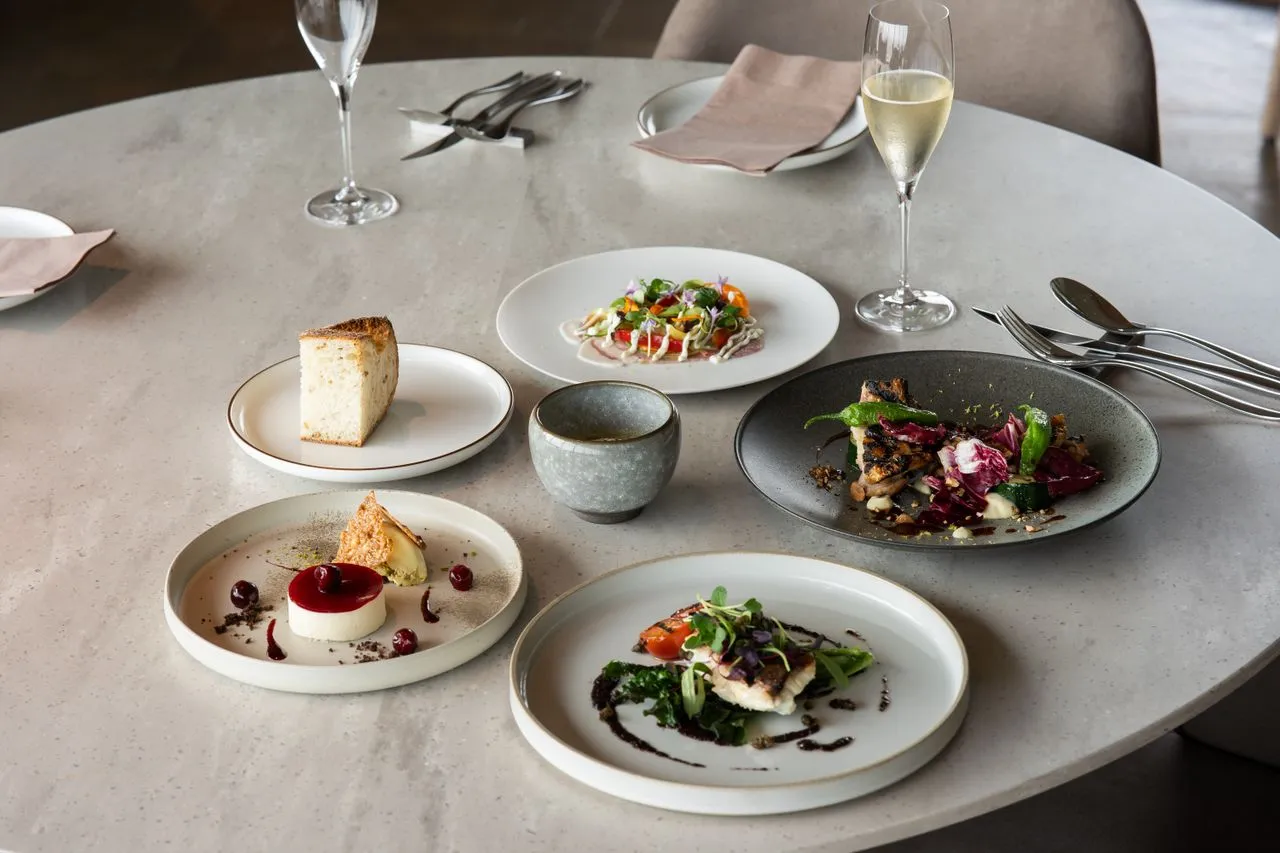 Catered dinner table prepared for event guests