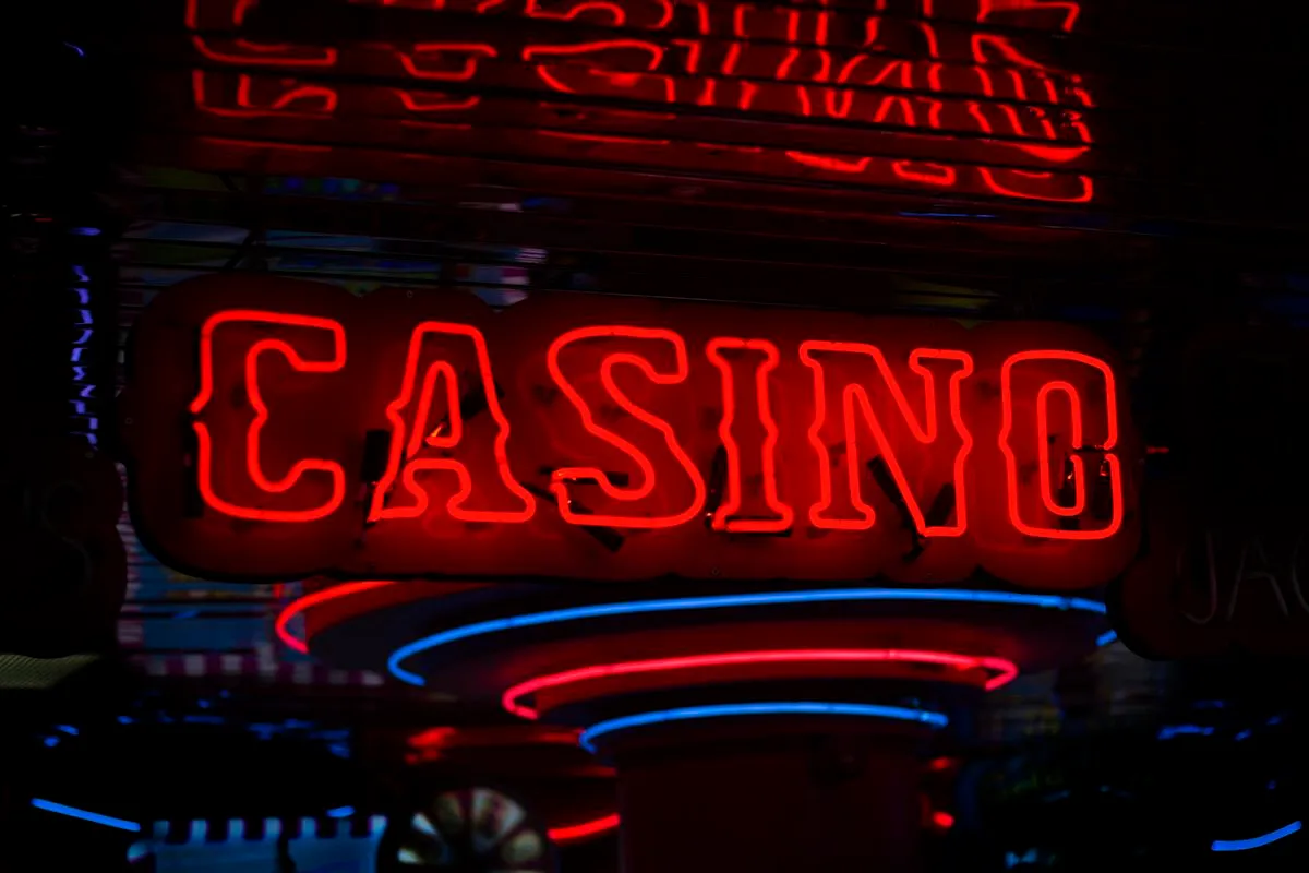 Illuminated entertainment sign at a night event