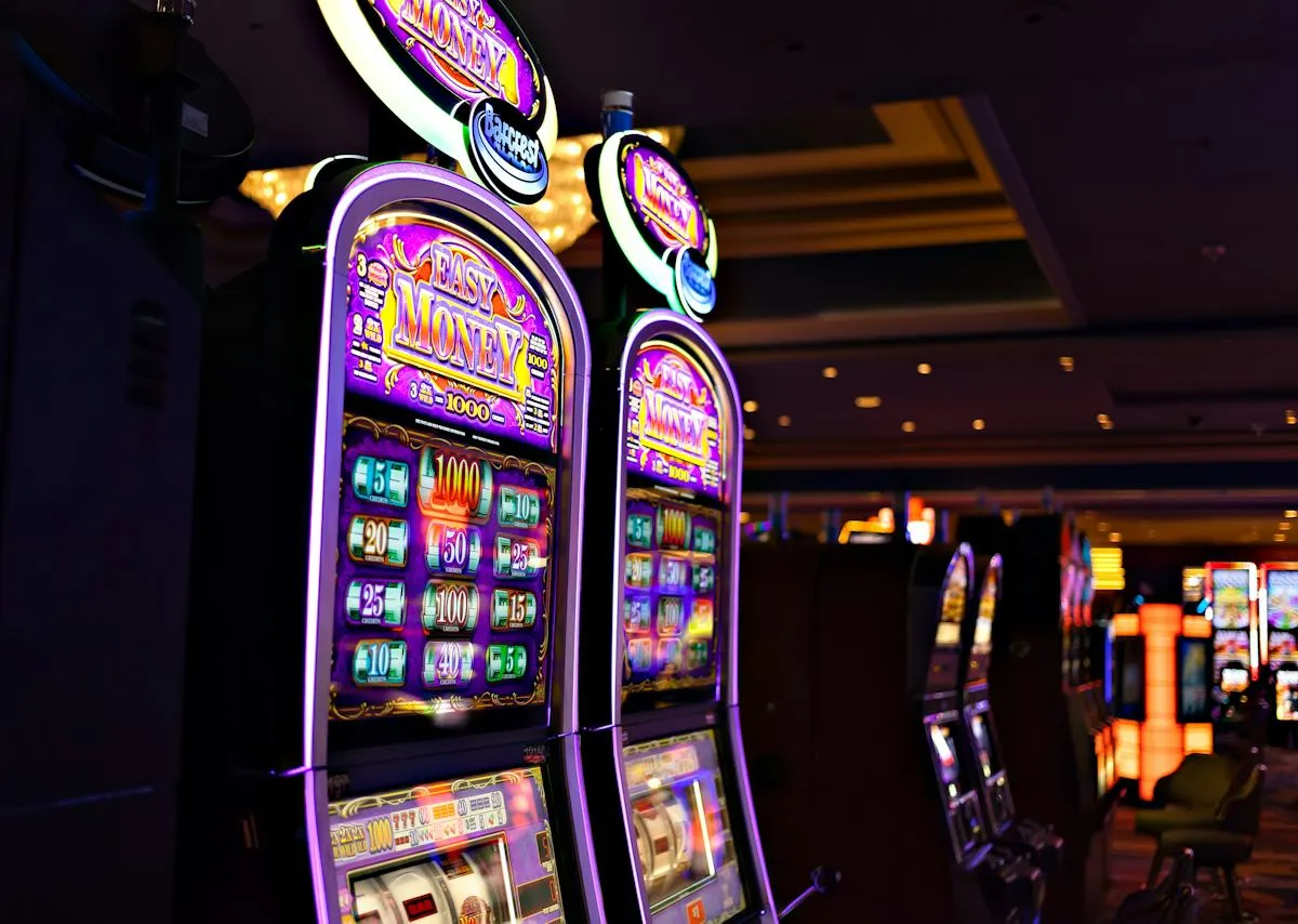 Slot-style entertainment area with dramatic event lighting