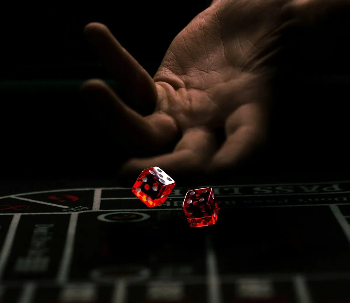 Hands arranging chips for a themed entertainment table